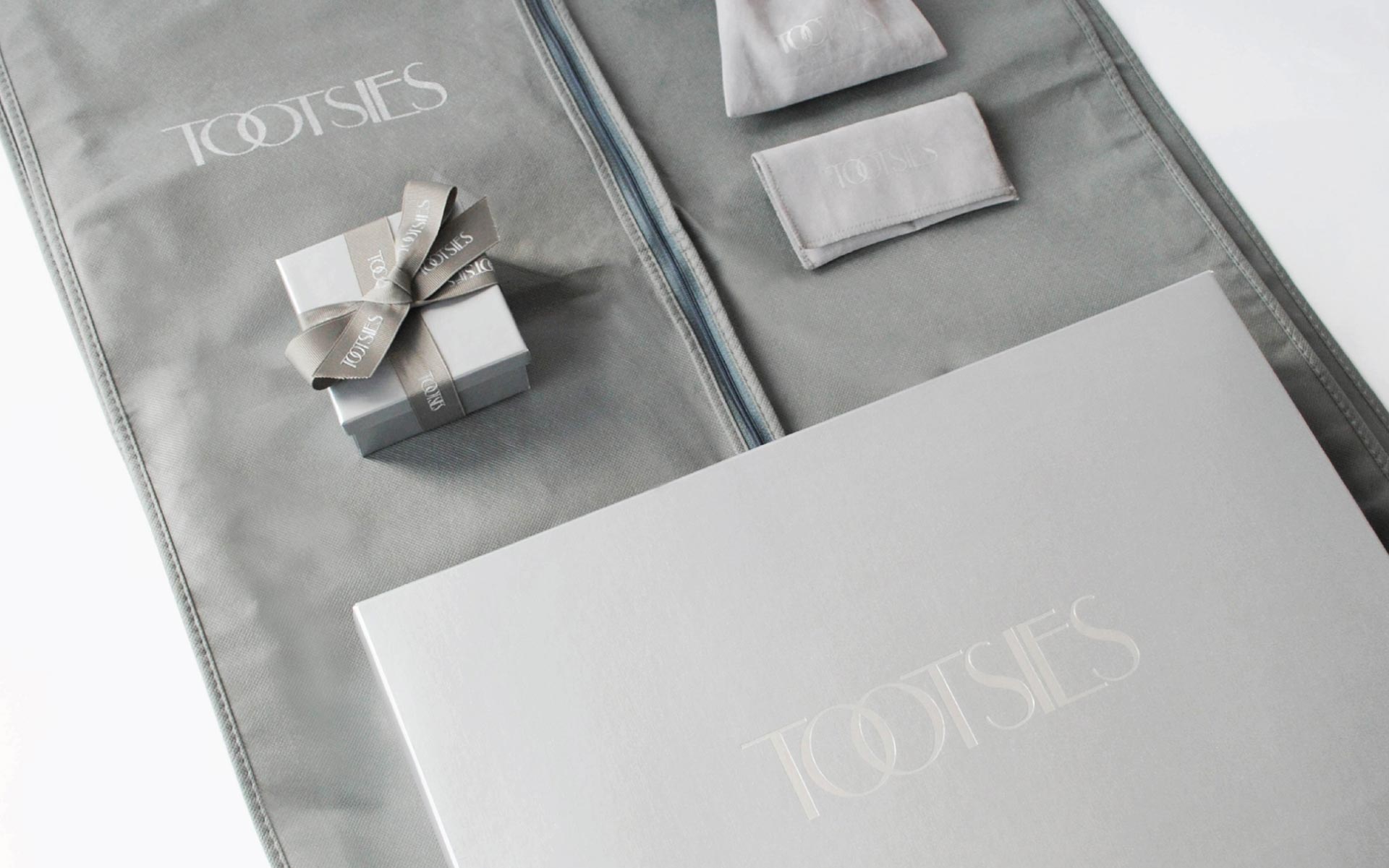 Image of custom luxury Tootsies packaging, designed by Creative Retail Packaging