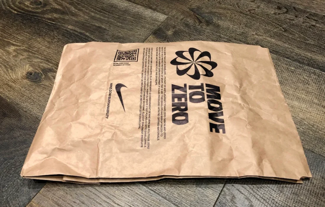 Branded kraft paper mailer with sustainability message, representing eco-friendly ecommerce packaging.