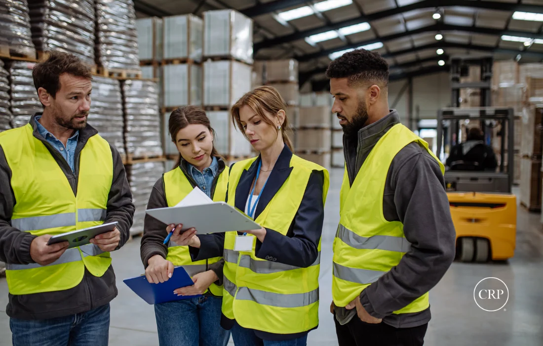 Packaging supply chain team conducting a warehouse quality control inspection.